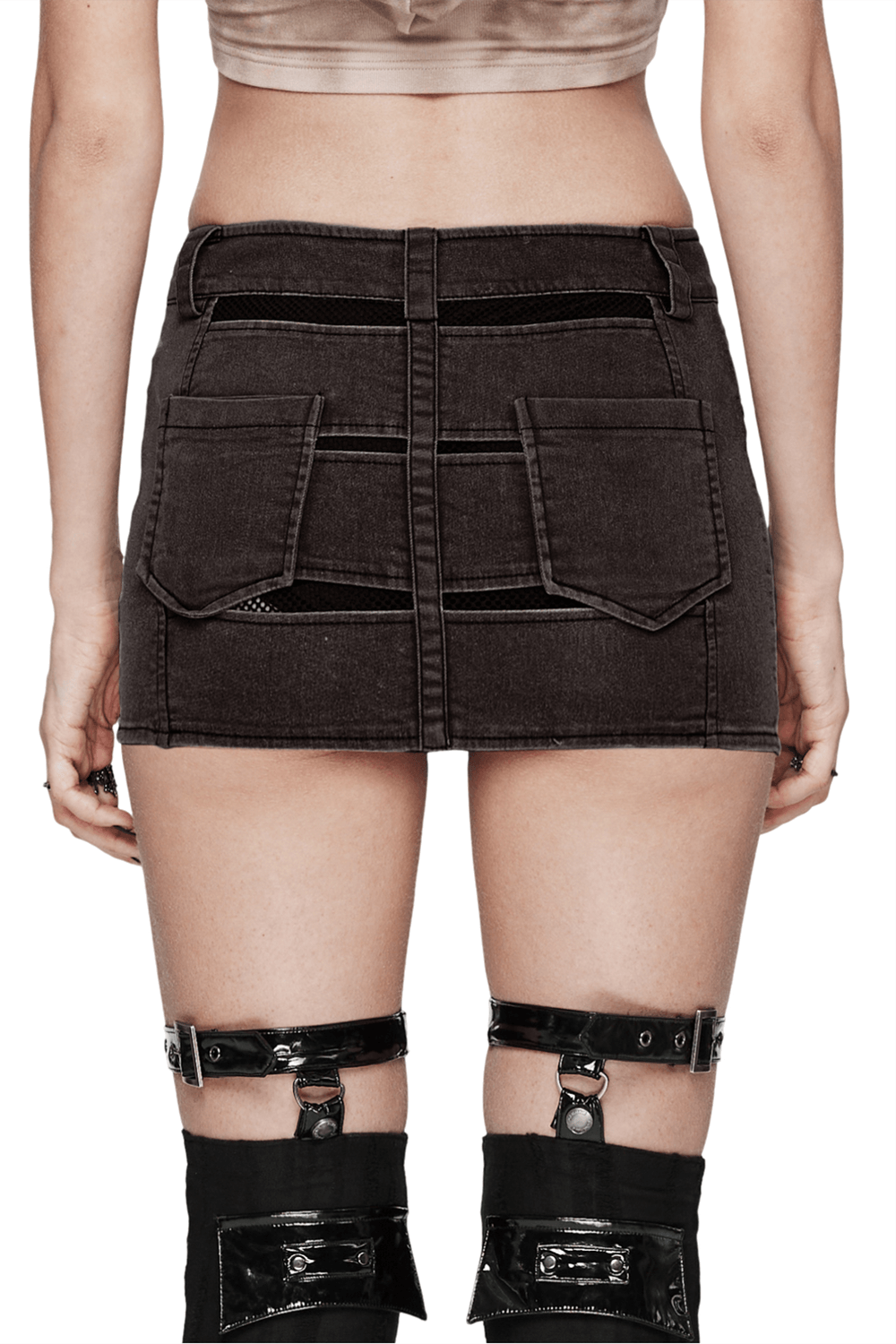 Back view of an edgy mini denim skirt with mesh pockets and zipper details for a punk rock style.