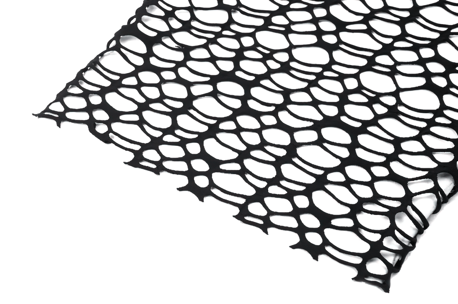 Gothic sheer spiderweb patterned fabric in black open-knit mesh design