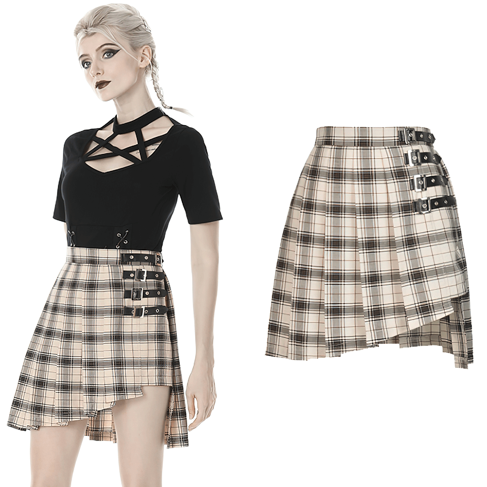 Edgy plaid asymmetrical skirt with bold buckles paired with a trendy black top, perfect for stylish rebellion.