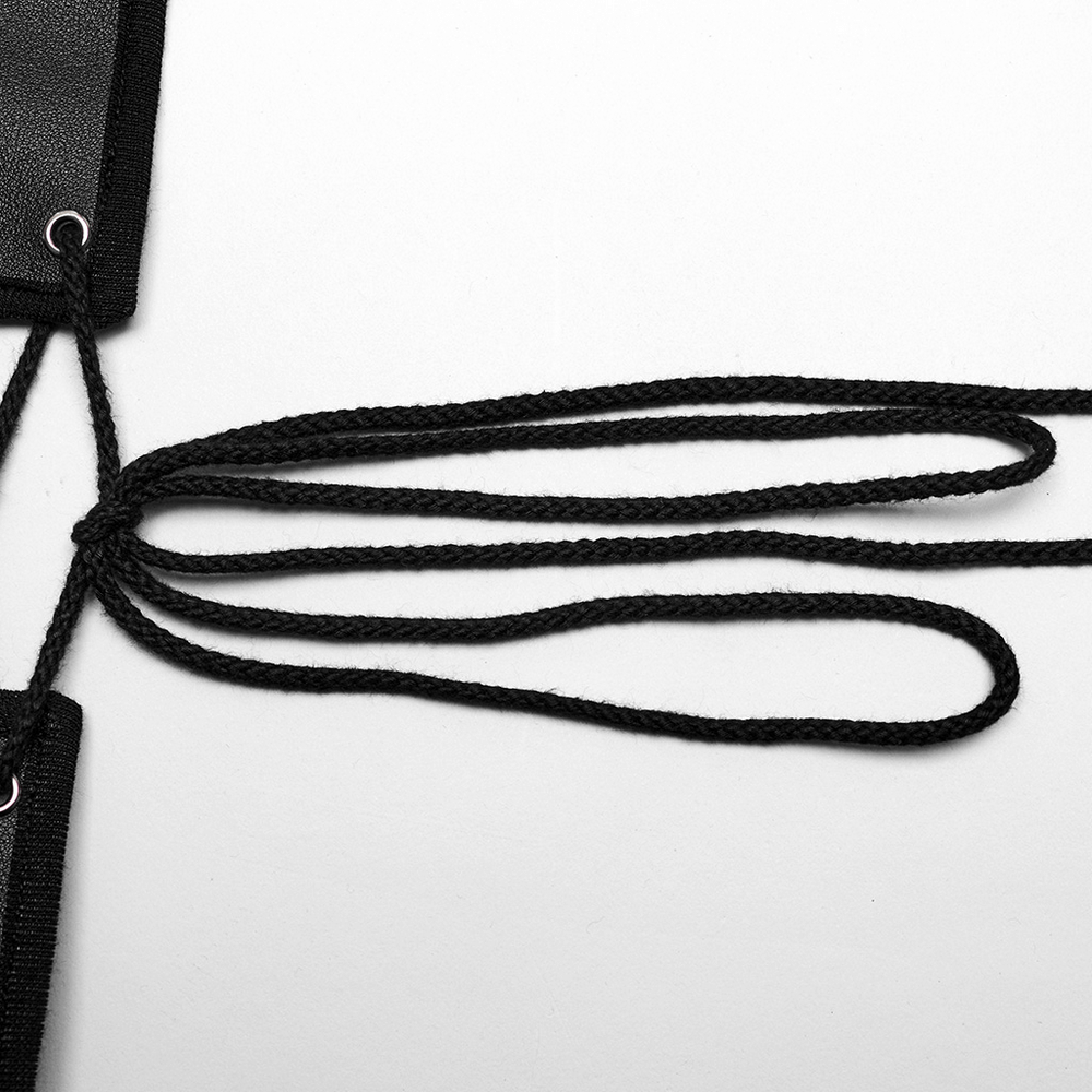 Close-up of black drawstring laces on a PU leather punk belt, showcasing adjustable features and edgy style.