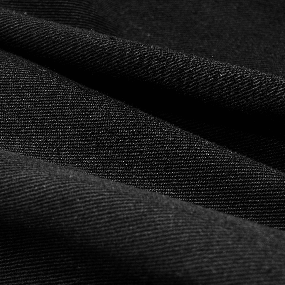 Close-up of black bourette twill fabric, showcasing its smooth, textured weave for stylish punk fashion.