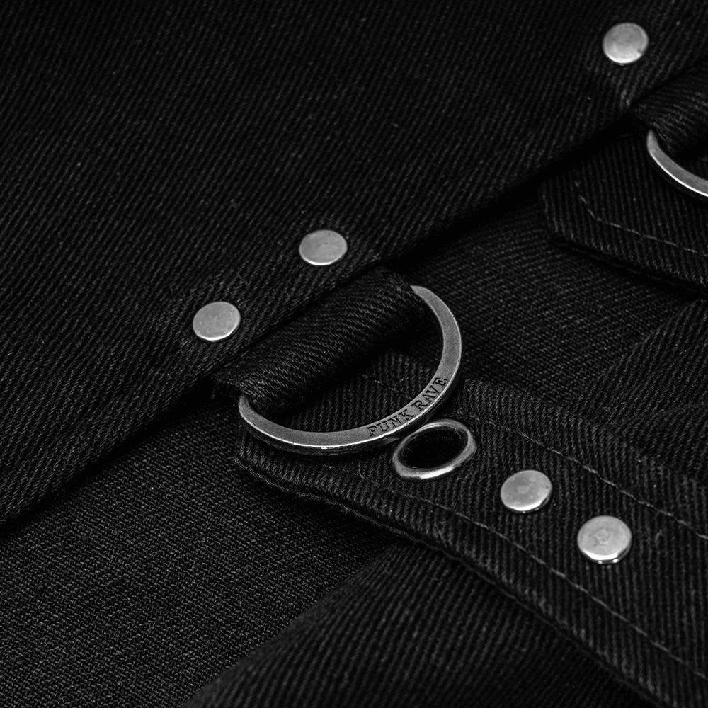 Close-up of the black punk overskirt's buckle loop and silver studs, showcasing edgy fashion details.