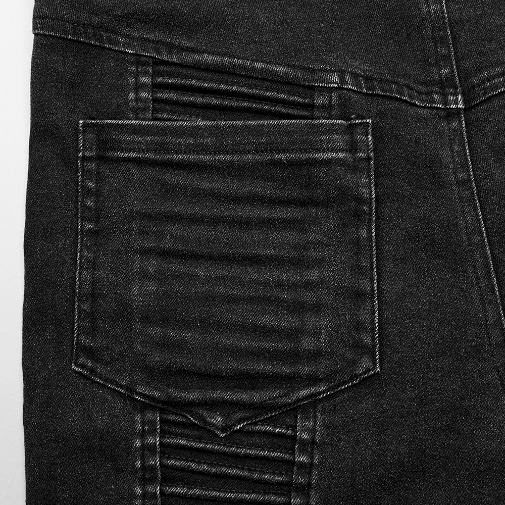 Close-up of edgy black skinny jeans pocket with unique stitch detailing and ribbed texture, perfect for a punk style.