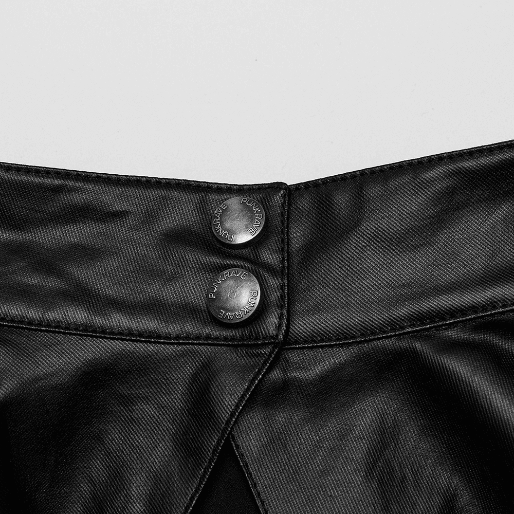 Close-up of adjustable buttons on the edgy punk cape, showcasing sleek black fabric and stylish design details.