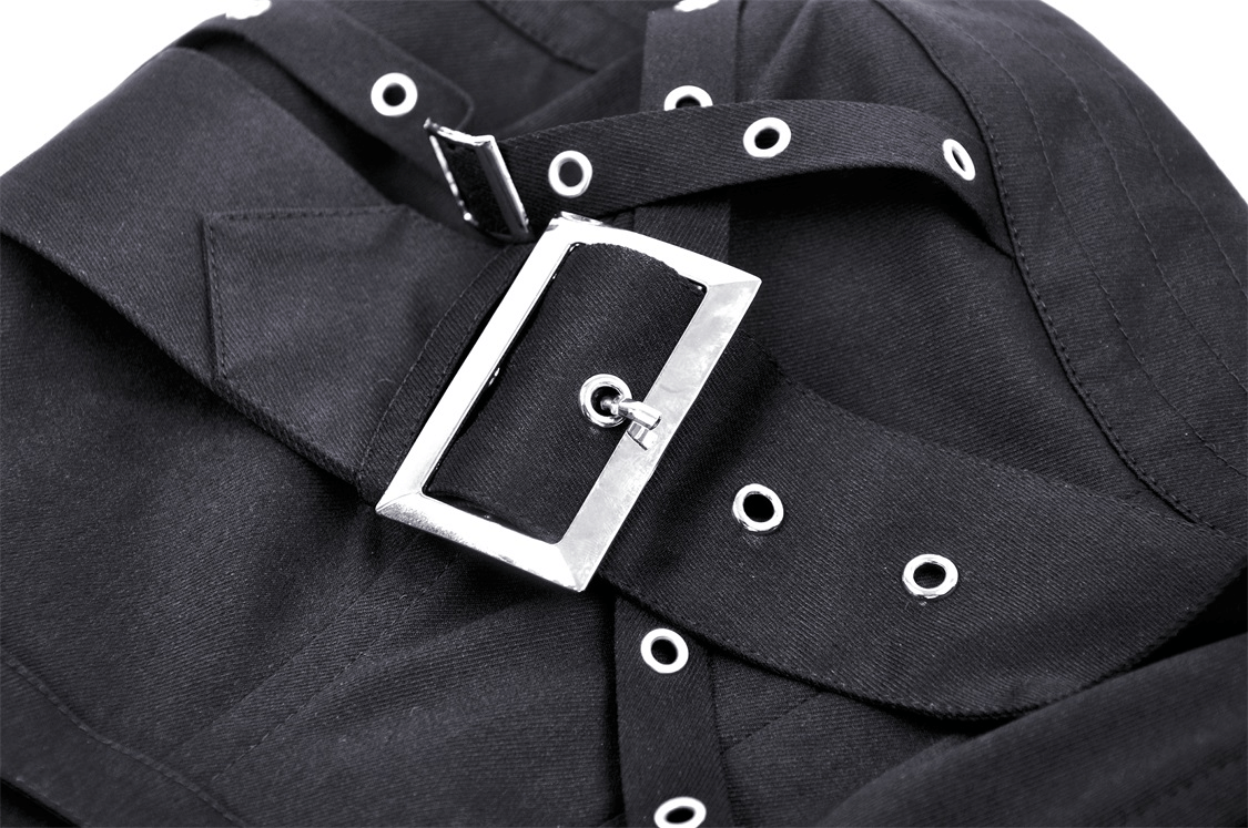 Close-up of edgy black corset top featuring stylish silver buckle and adjustable straps for a perfect fit.
