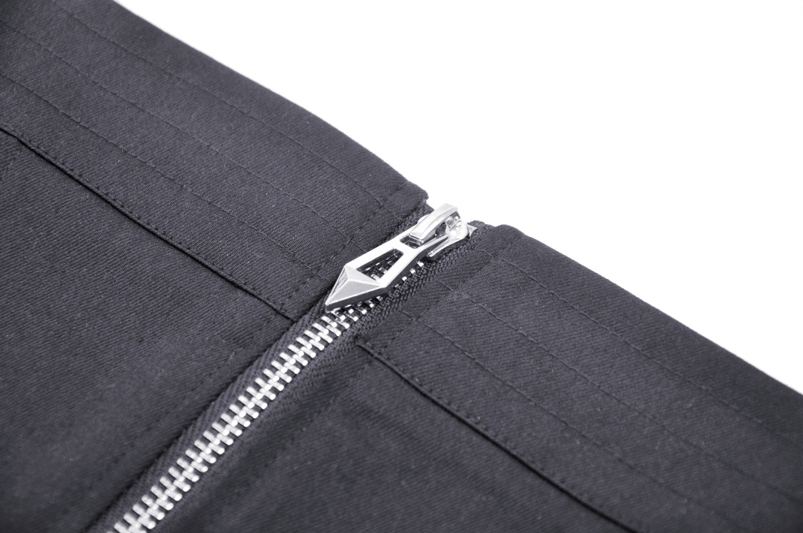 Close-up of sleek black corset top zipper detail, featuring metallic finish and stylish design elements.
