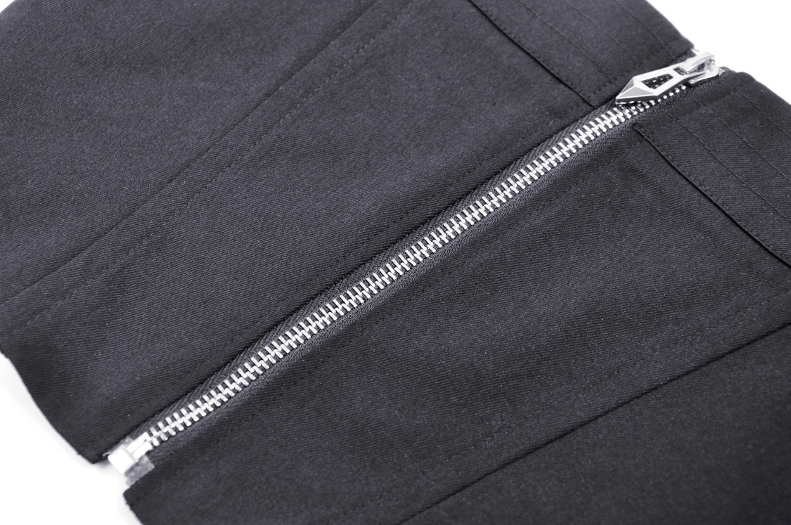 Close-up of black corset top featuring silver zipper detail and sleek fabric texture, perfect for edgy fashion.