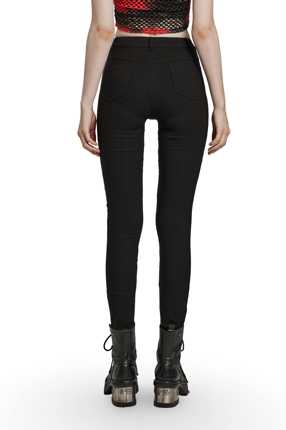 Back view of edgy punk mesh burnt pattern trousers, showcasing sleek fit and stylish design paired with black ankle boots.