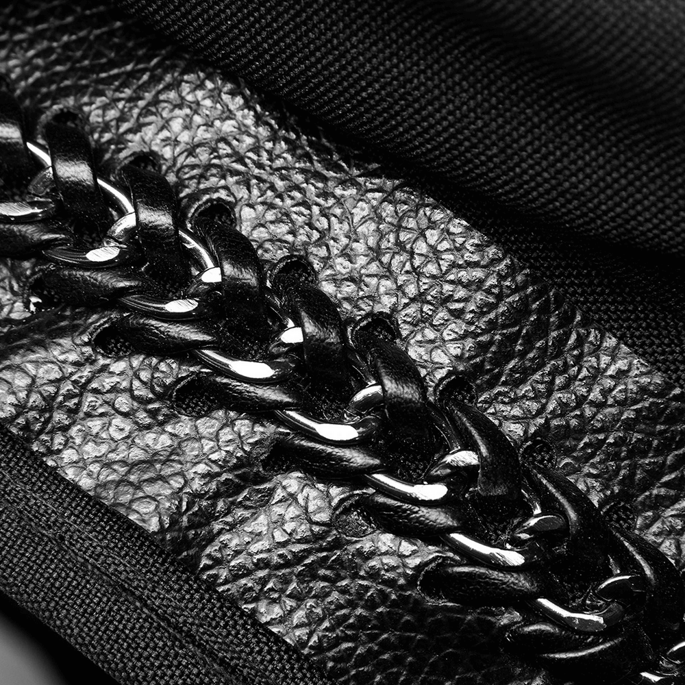 Close-up of black PU leather featuring braided accents on an edgy punk hat.