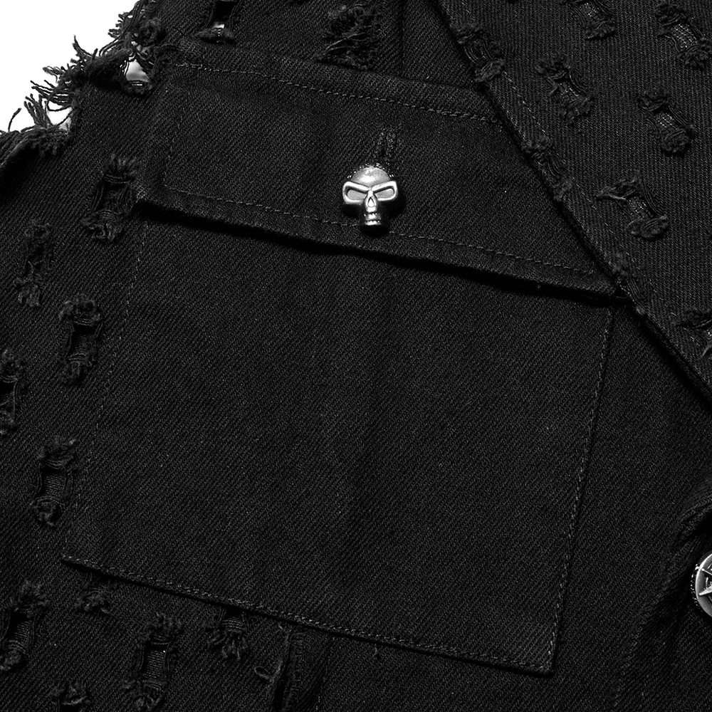 Close-up of distressed black medium-length cape featuring frayed edges and skull button detail.