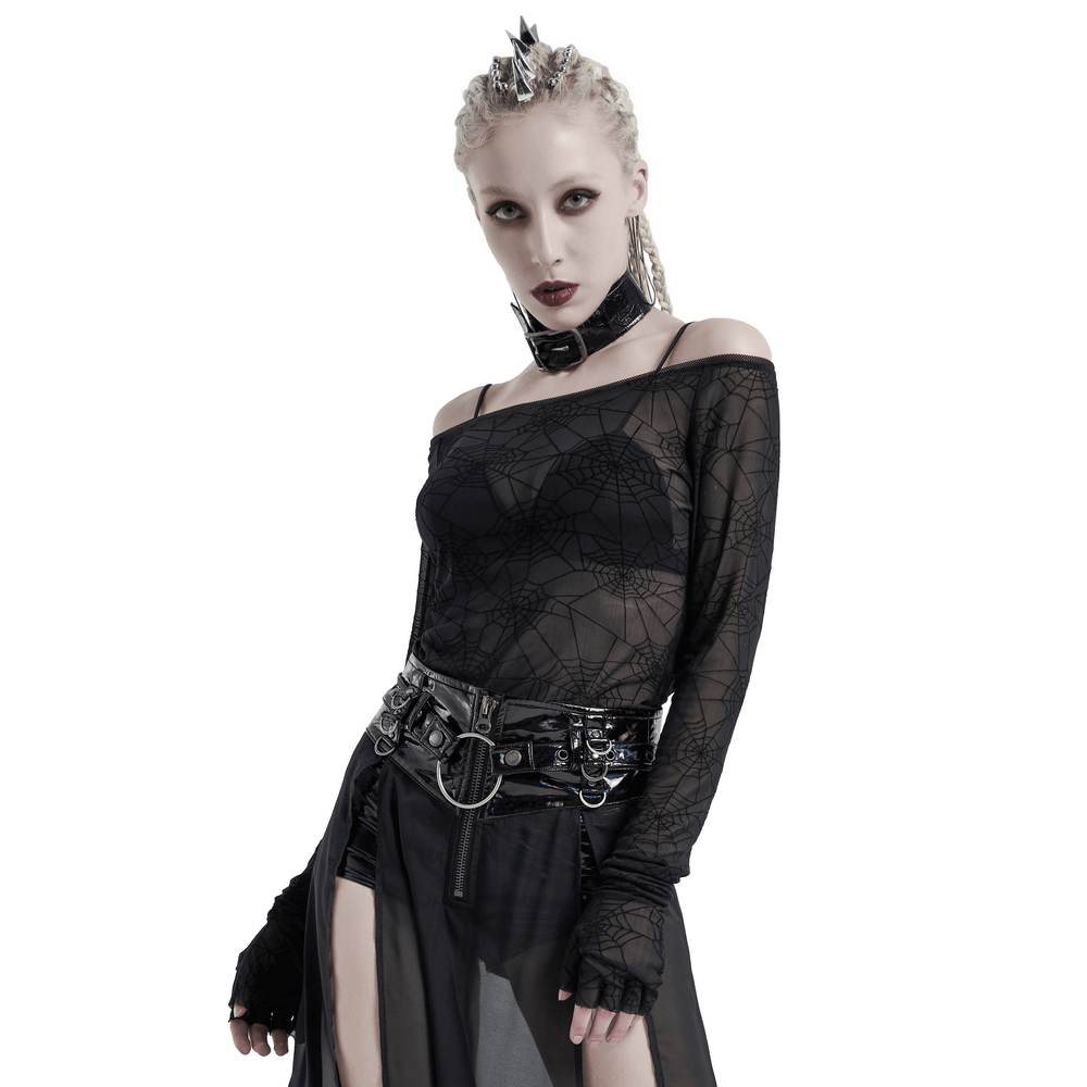 Edgy punk model wearing a black cobweb mesh top with finger cuffs, showcasing alternative fashion at its finest.