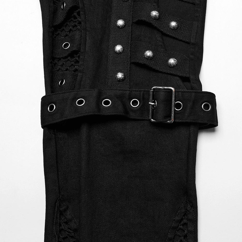 Close-up of Edgy Punk Riveted Slim Jeans with mesh panels, silver studs, and buckle detail for a chic, edgy look.