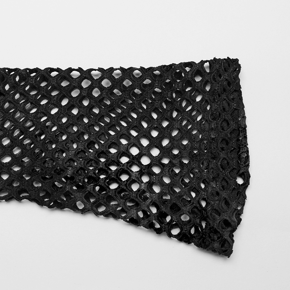 Close-up of black mesh fabric showcasing intricate fishnet design for punk rock style crop top.