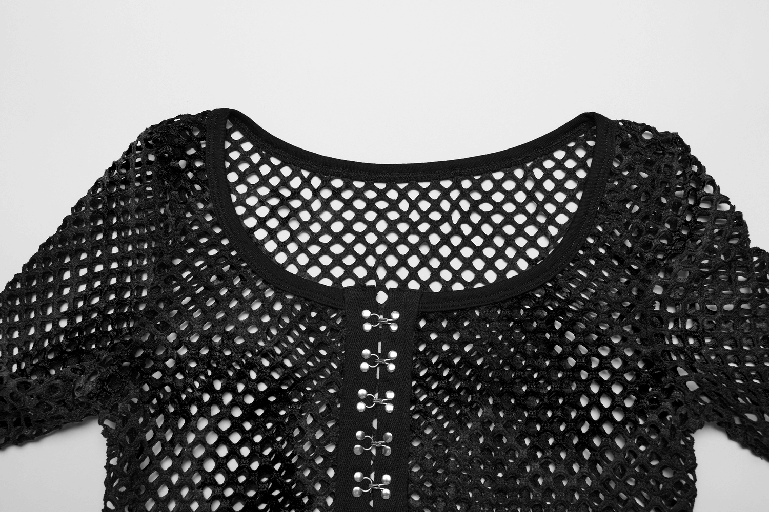 Black mesh crop top with sheer long sleeves and front hooks, perfect for a punk rock look.