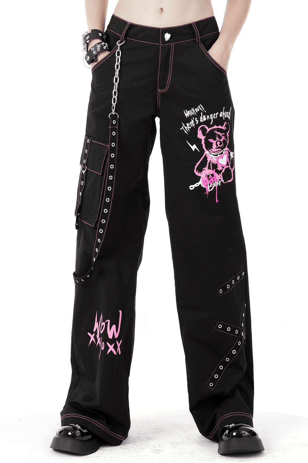 Edgy punk rock wide pants featuring pink skull graphics, chains, and spacious pockets for a rebellious style.