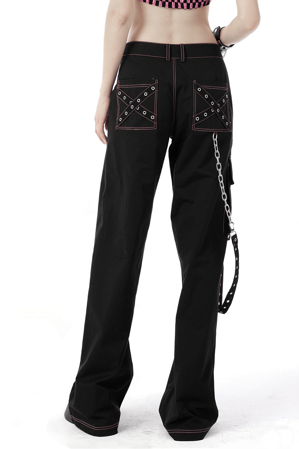 Edgy black punk rock wide pants with chains and pockets, featuring pink skull details and bold stitching.