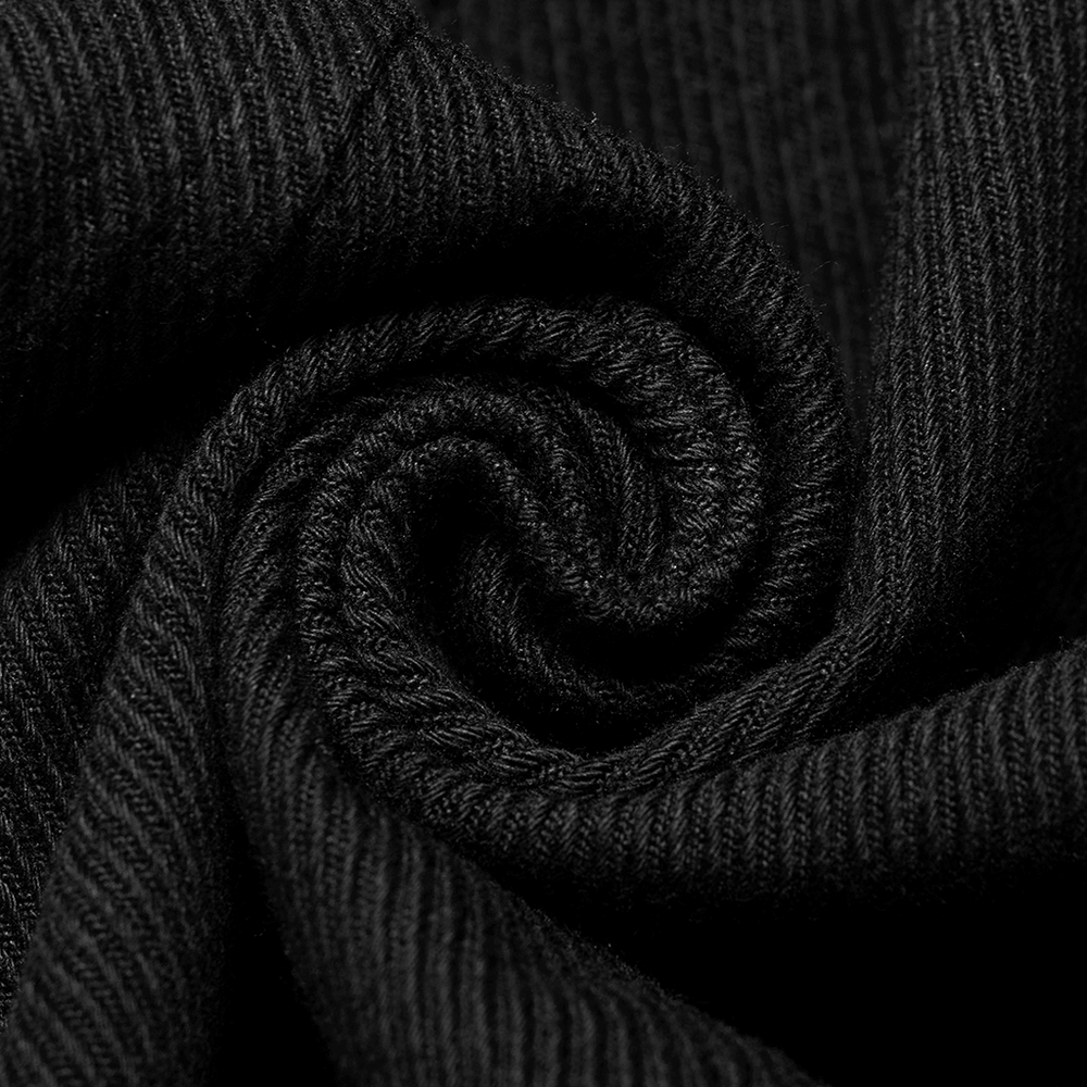 Close-up of soft black twill fabric showcasing its elastic texture and quality for clothing.