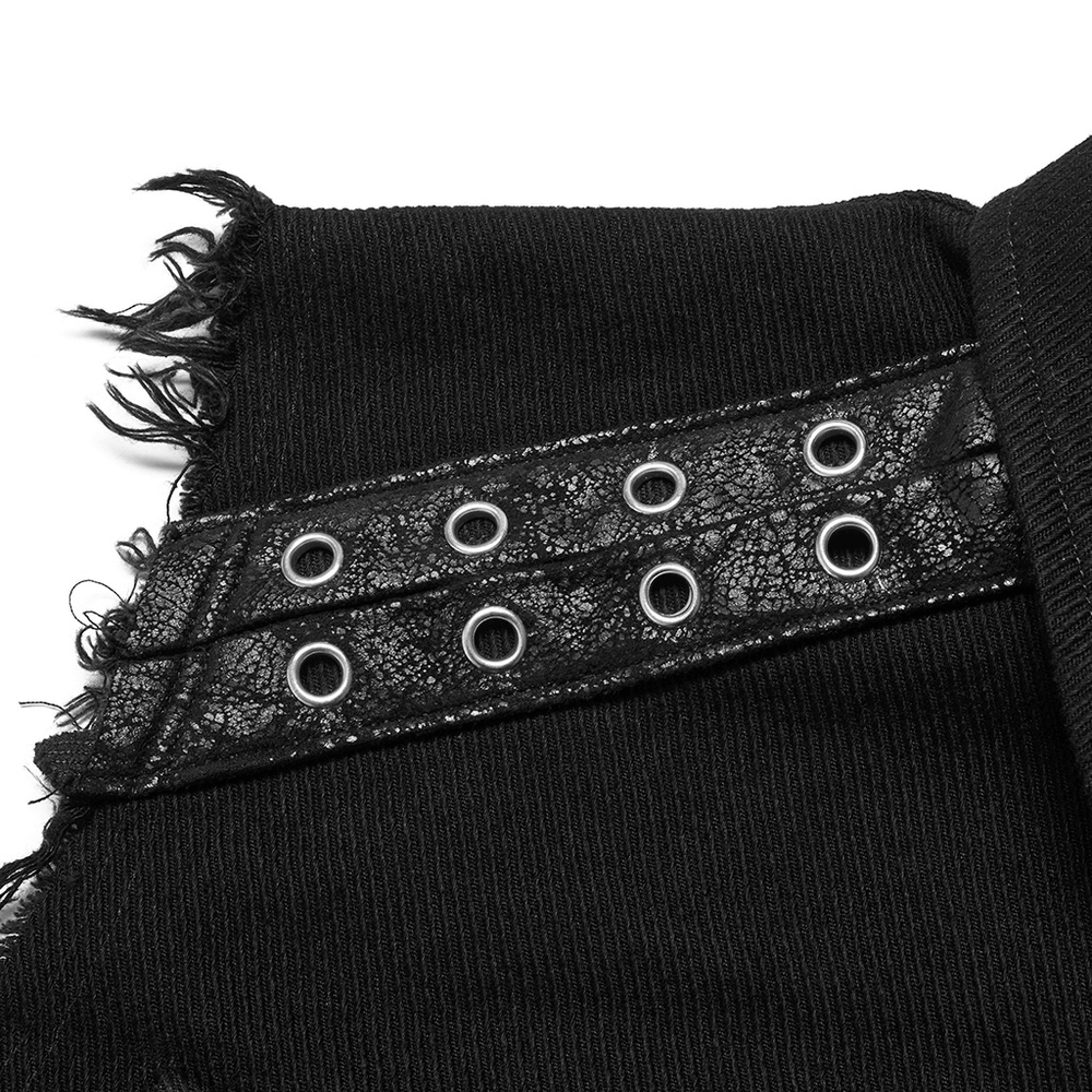 Close-up of a black punk vest featuring lace and metal eyelet detailing for an edgy look.