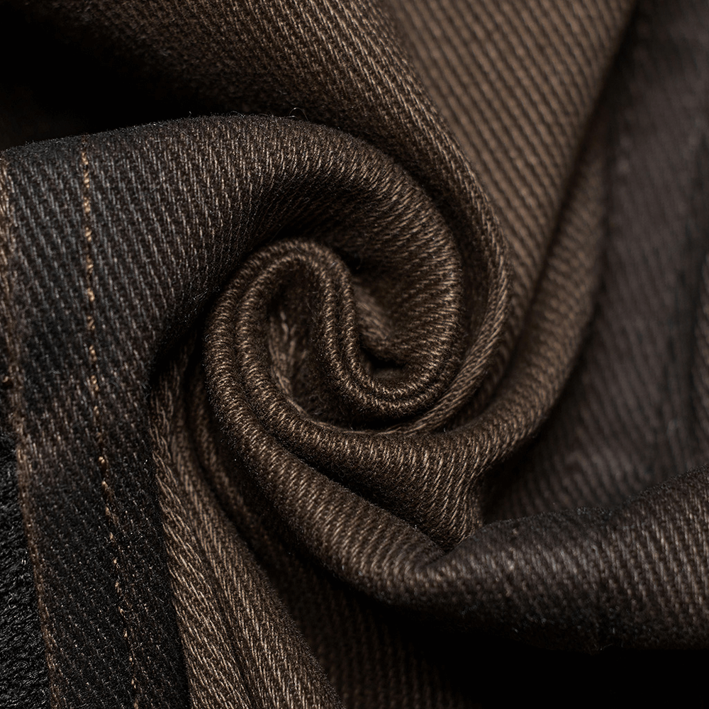 Close-up of soft brown twill fabric showcasing its smooth texture and intricate weave patterns.