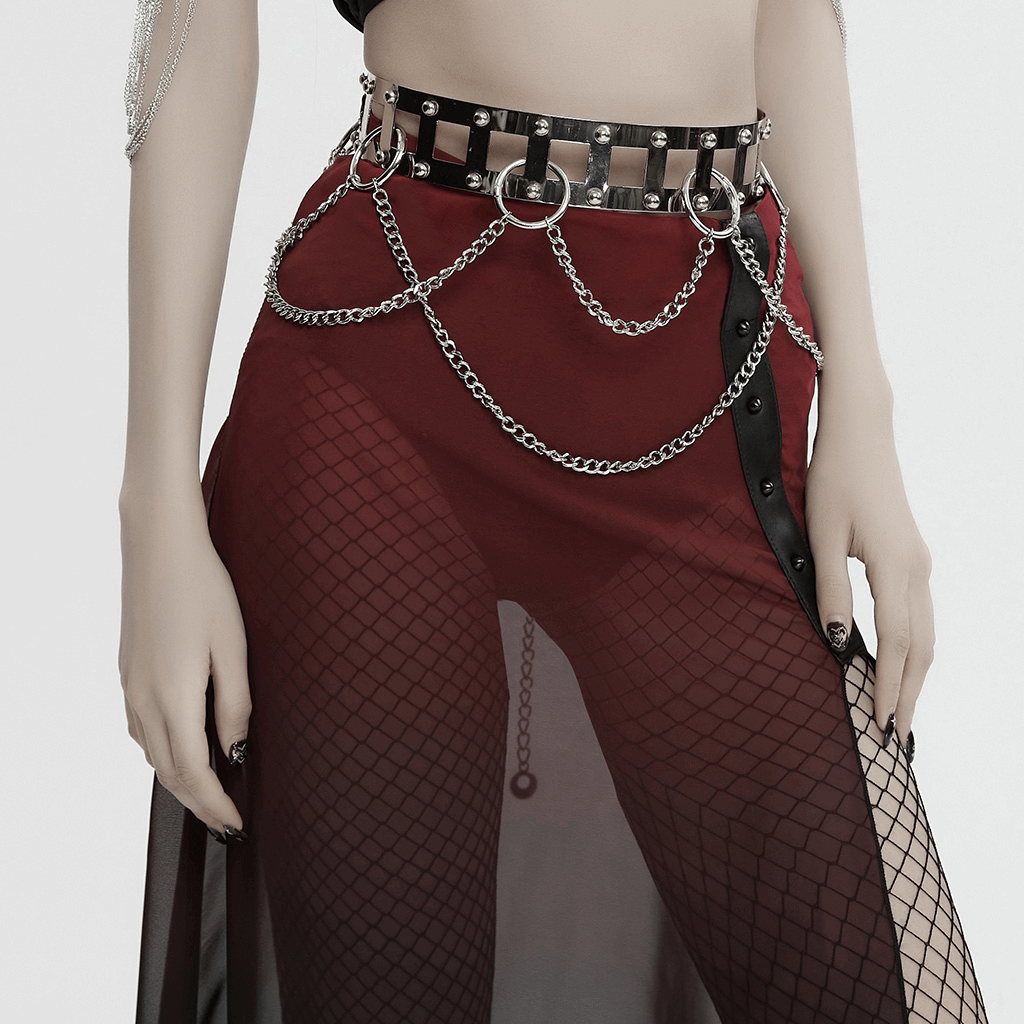 Edgy silver punk chain belt with rivets over fishnet skirt, showcasing bold fashion statement and individuality.