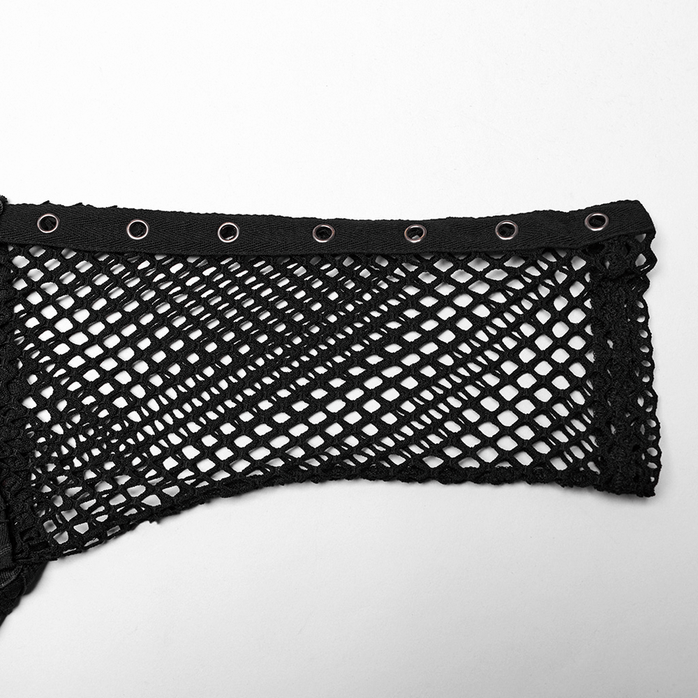 Close-up of black mesh fabric with grommet details for punk style clothing.