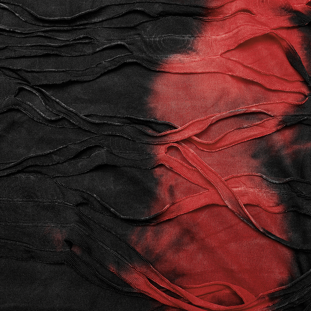 Close-up of edgy red and black tie-dye fabric with shredded texture for punk-style women's top.