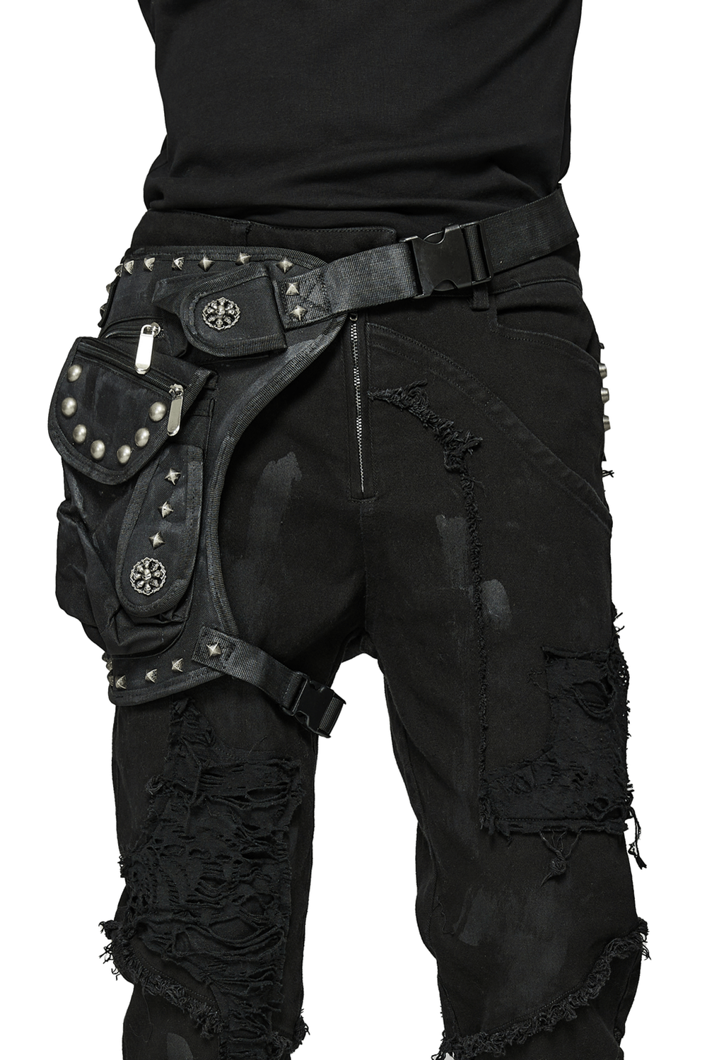 Edgy punk waist bag with rivets and adjustable straps, styled with distressed black jeans.