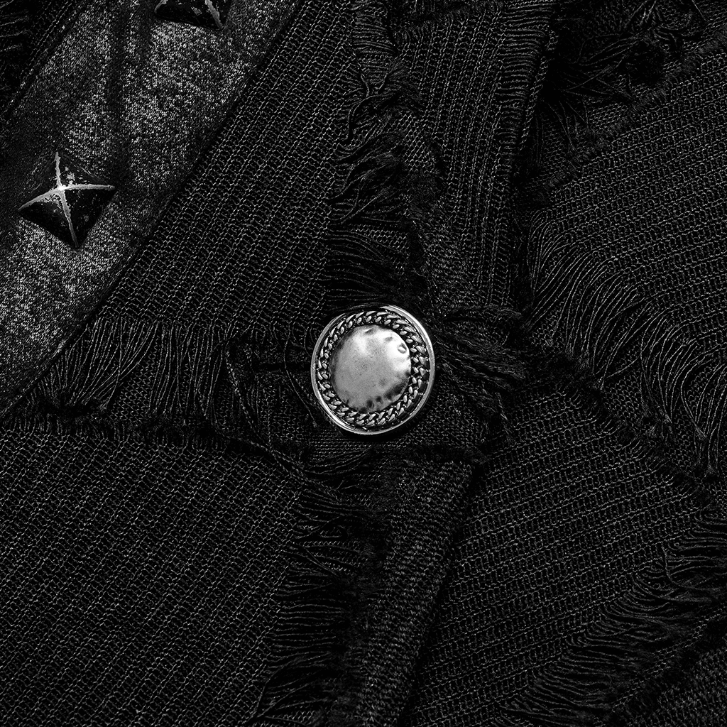 Close-up of edgy black punk vest featuring a stylish silver button and distressed fabric details.