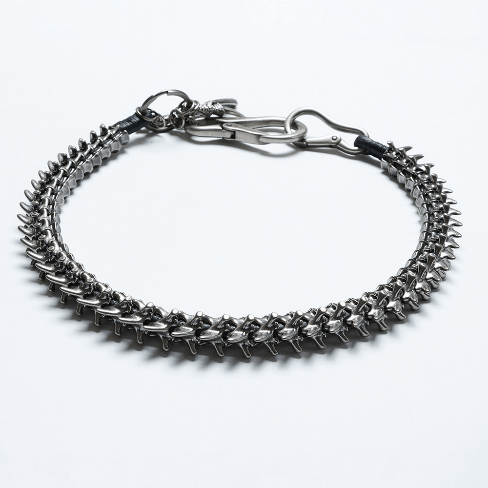 Edgy skeleton waist chain with lobster clasps and punk skull charms for bold apocalyptic style.