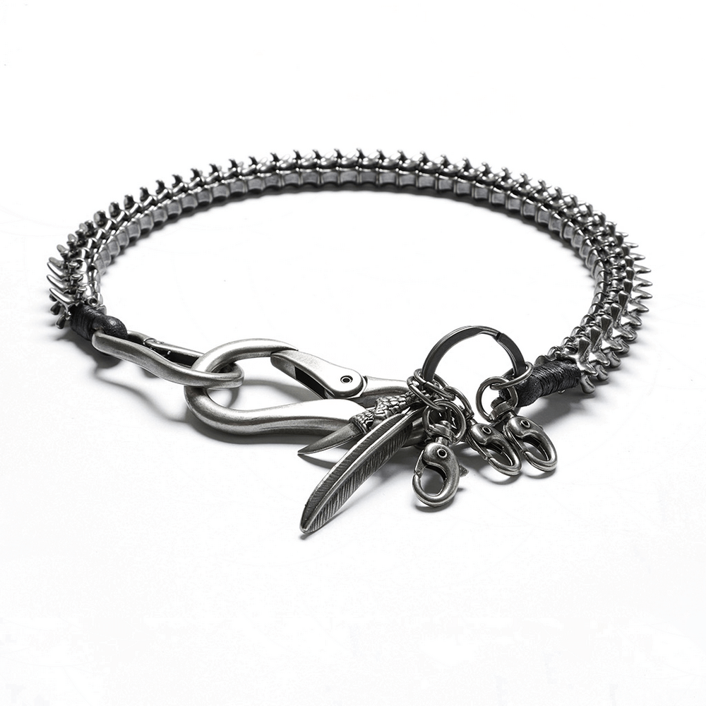 Edgy skeleton waist chain with lobster clasps, skull and feather charms, and spine design offering a bold apocalyptic punk aesthetic.