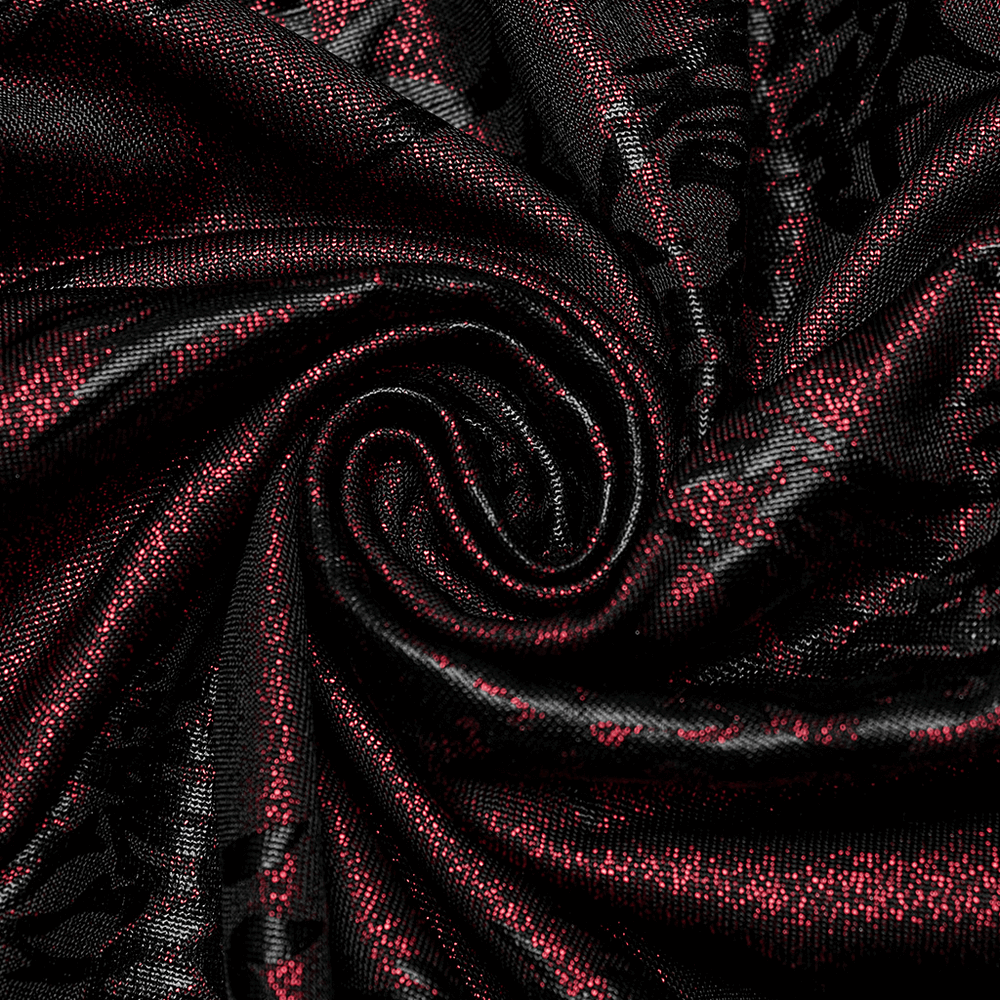 Close-up of shimmering black and red fabric with a unique tree texture, perfect for edgy sparkly flared pants.