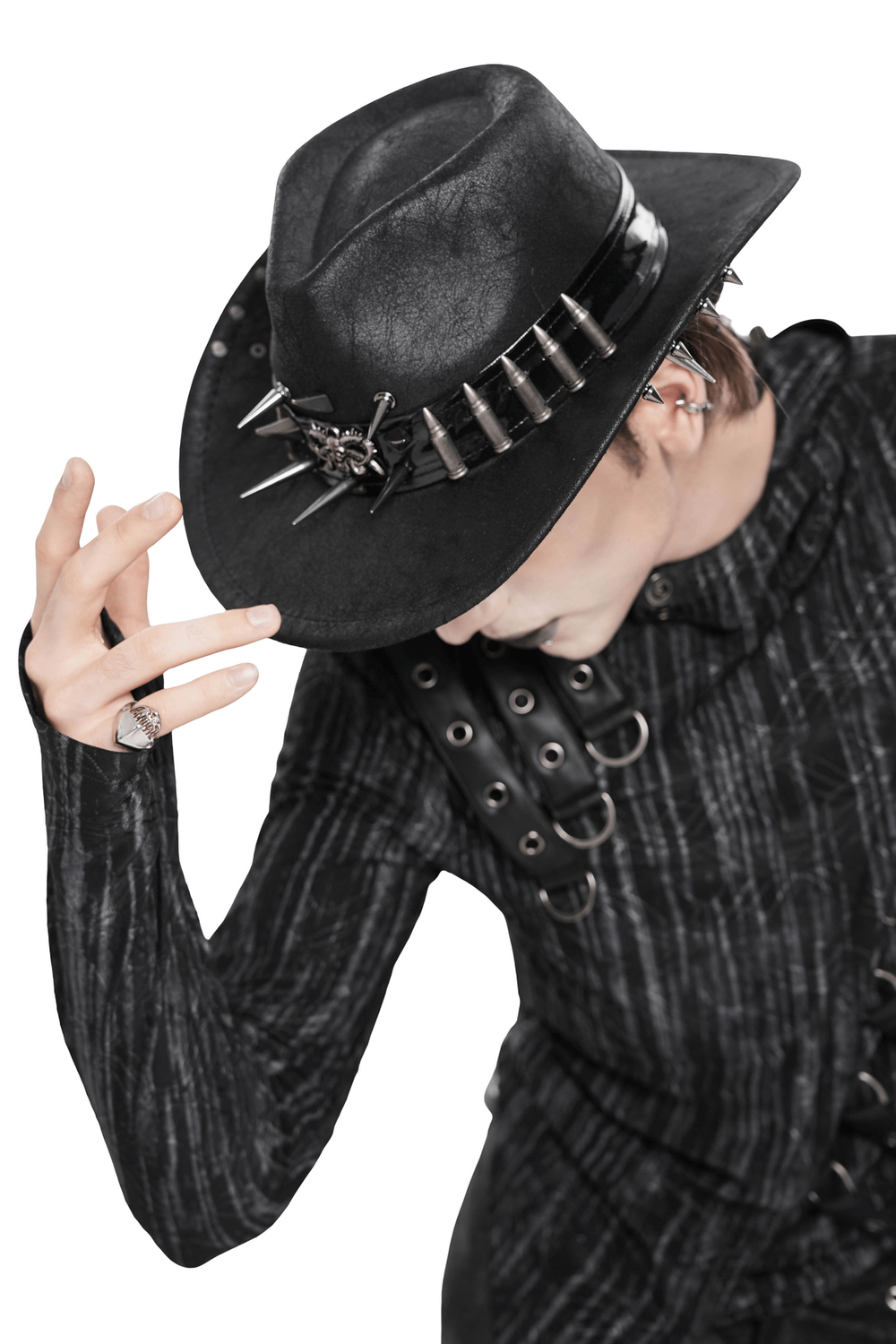 Edgy Spiked Bullet Trim Gothic Western Cowboy Hat worn with a stylish outfit, featuring metal spikes and studs.