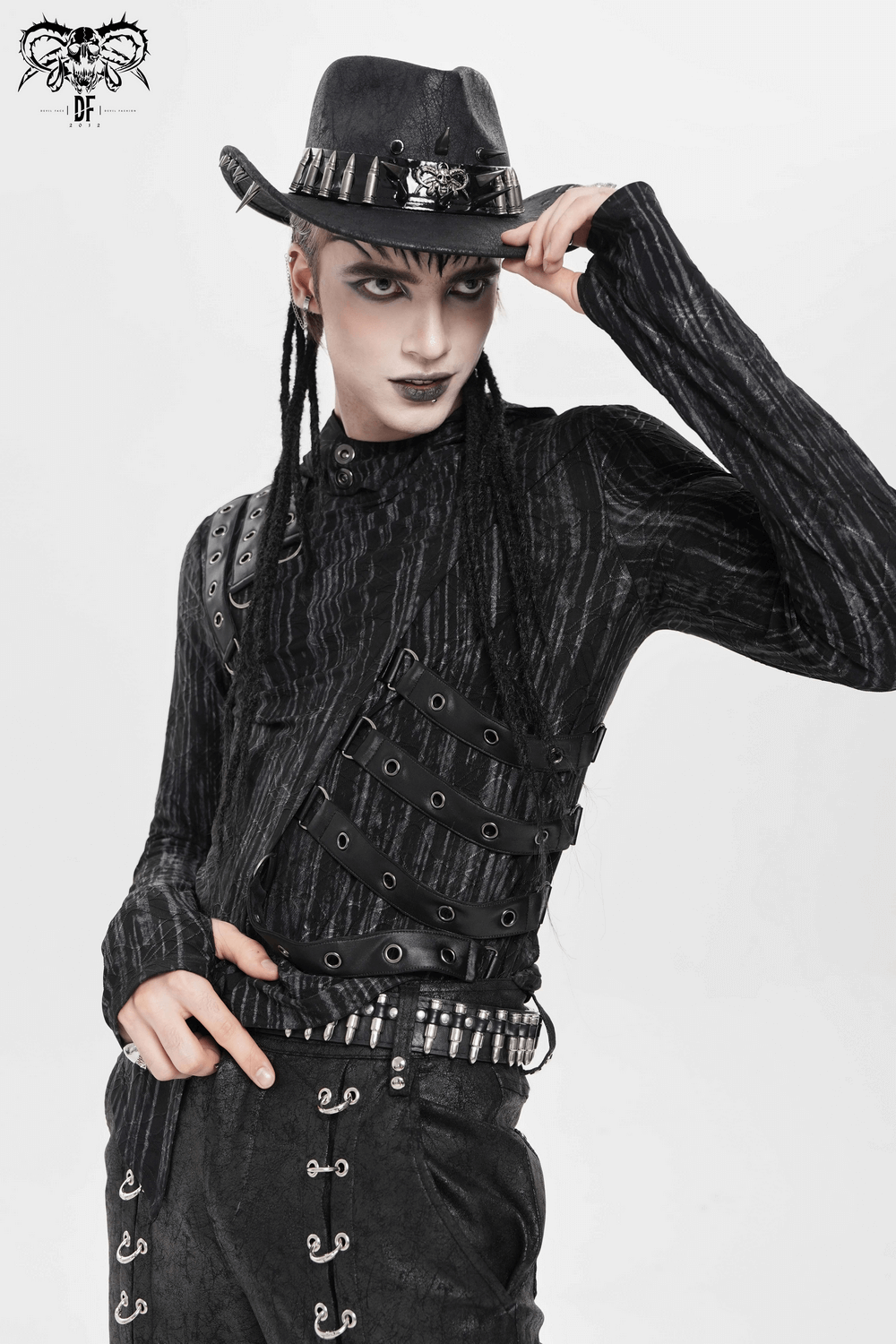 Edgy Spiked Bullet Trim Gothic Western Cowboy Hat worn by model in black outfit with layered leather details.