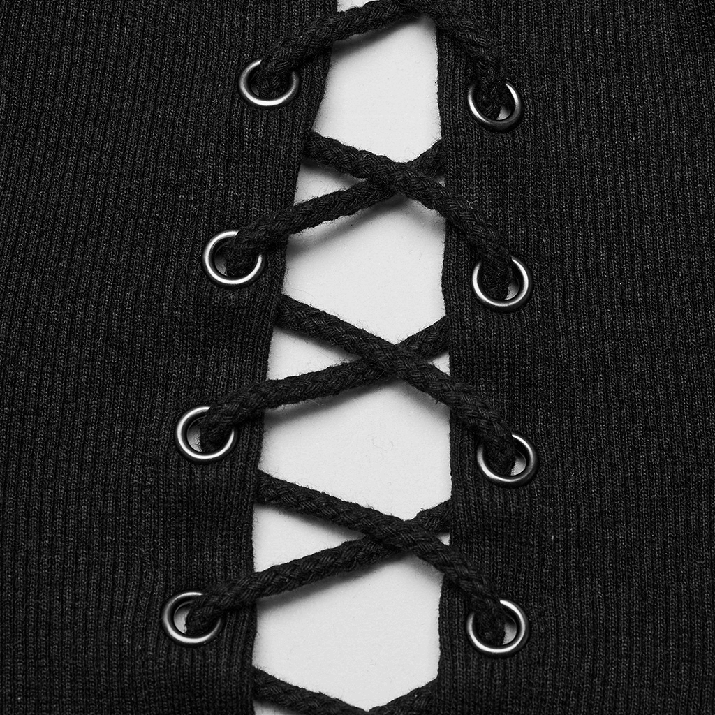 Close-up of black ribbed fabric with lace-up detail and metal grommets, showcasing steampunk style.