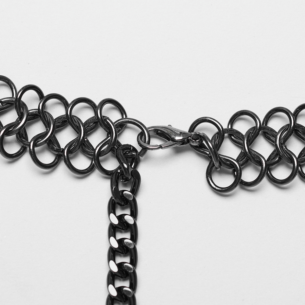 Close-up of an edgy punk metal waist chain with rivet details and a clasp, showcasing bold textures and designs.