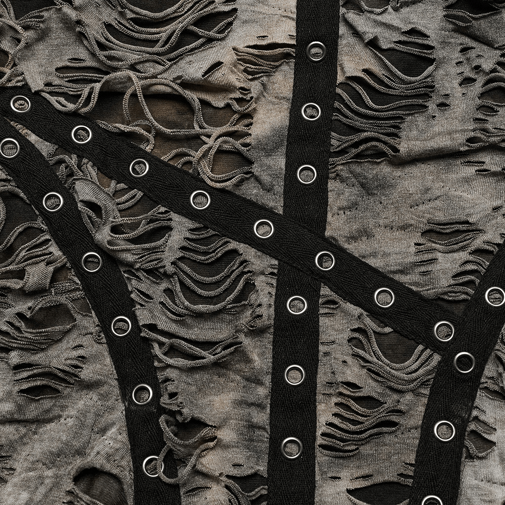 Close-up of edgy tie-dye knit fabric with distressed texture and decorative corn ribbon for a grunge style.