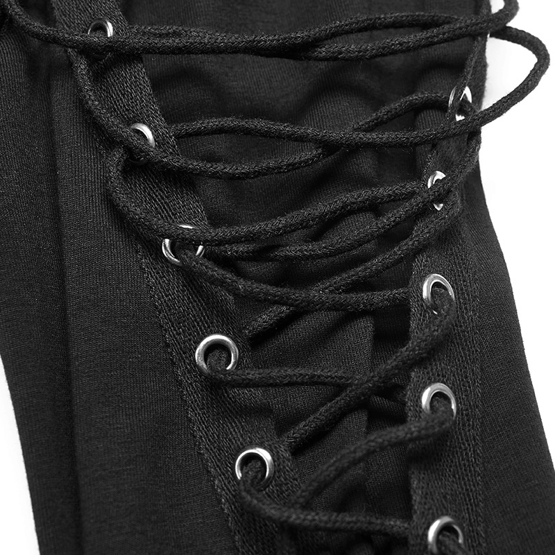 Close-up of intricate lace-up detail on a black hooded sweatshirt, showcasing edgy fashion elements.