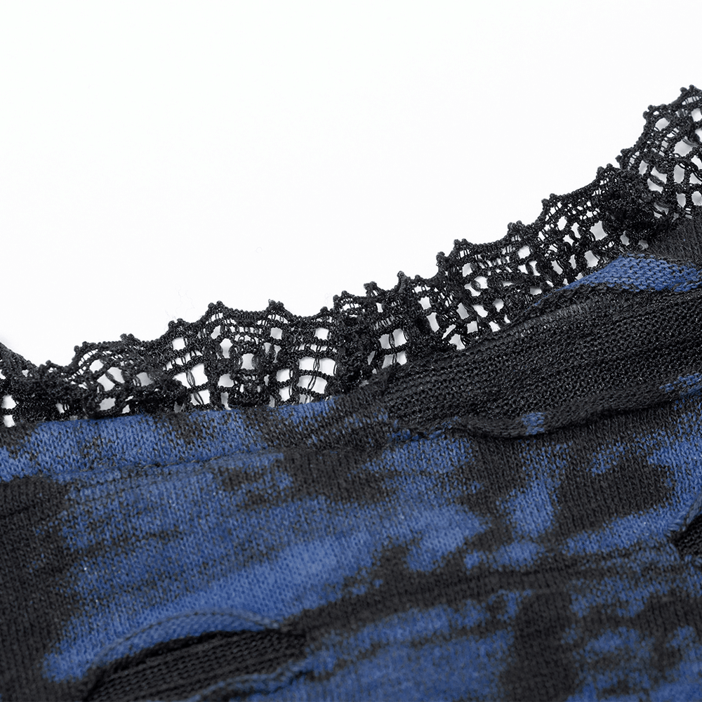 Close-up of lace detailing on Gothic abstract print slip dress in blue and black.