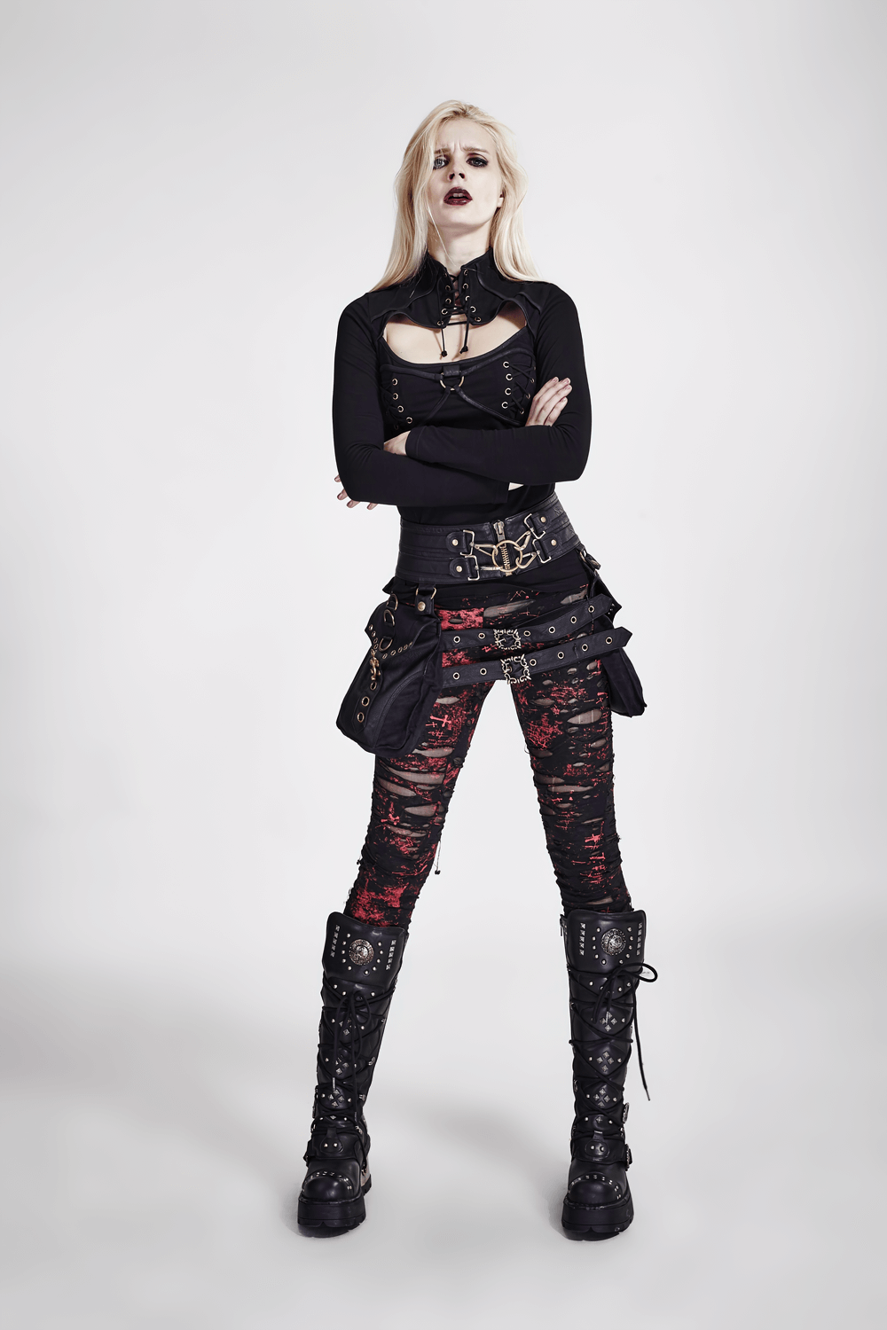 Edgy women's shredded punk rock leggings with red-black mesh, perfect for alternative fashion and gothic style.