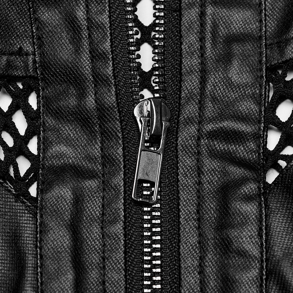 Close-up of zipper on black punk leather vest with mesh detailing, showcasing edgy fashion elements.