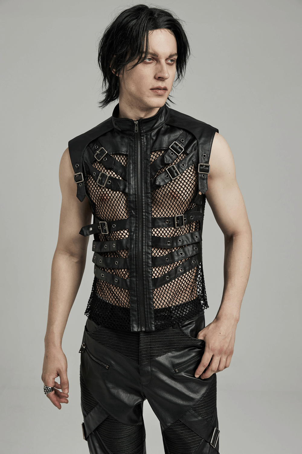 Edgy black punk leather vest with mesh back, showcasing a rockstar vibe and stylish design for men.