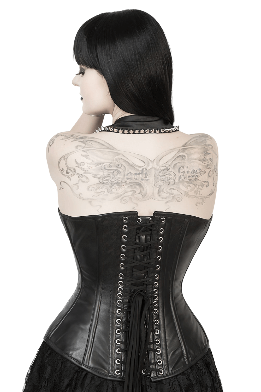 Model showcasing a vintage-inspired black long-line overbust corset with intricate back lacing and tattoo detail.