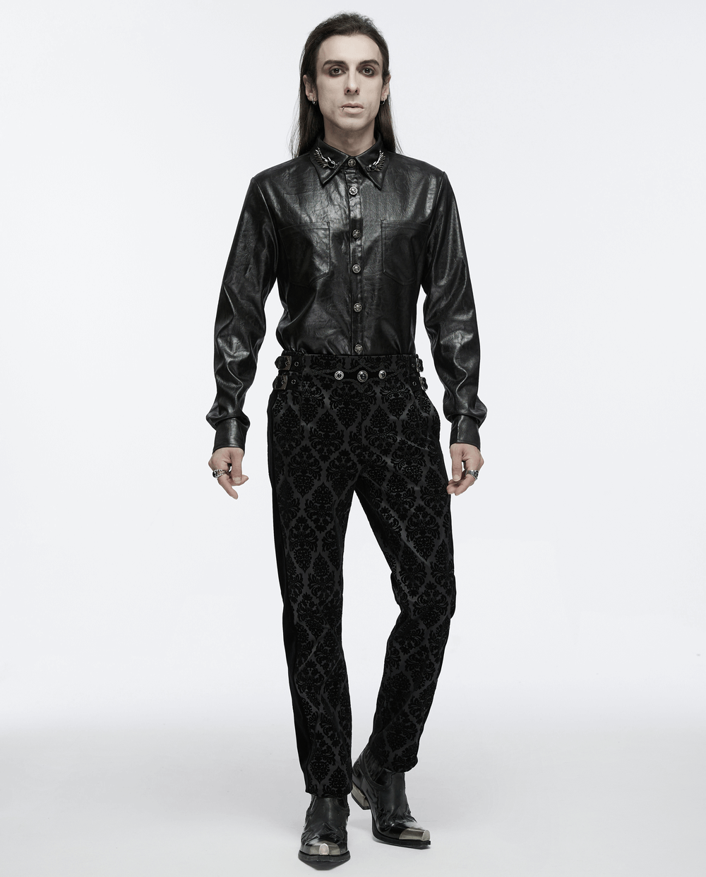 Elegant men's gothic leather shirt with skull buckles, styled with black patterned pants for a bold, edgy look.