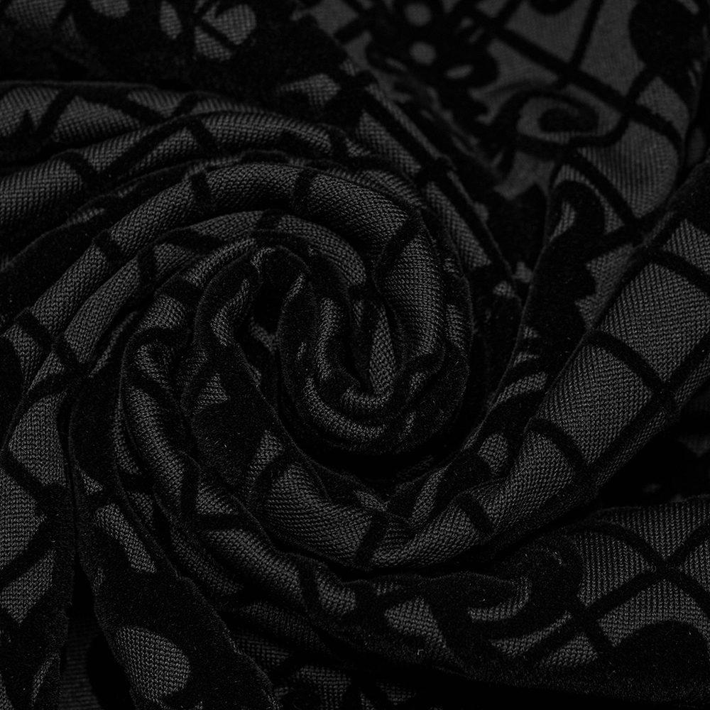 Close-up of black elastic knitted fabric with Gothic flocking pattern, ideal for dark fashion.