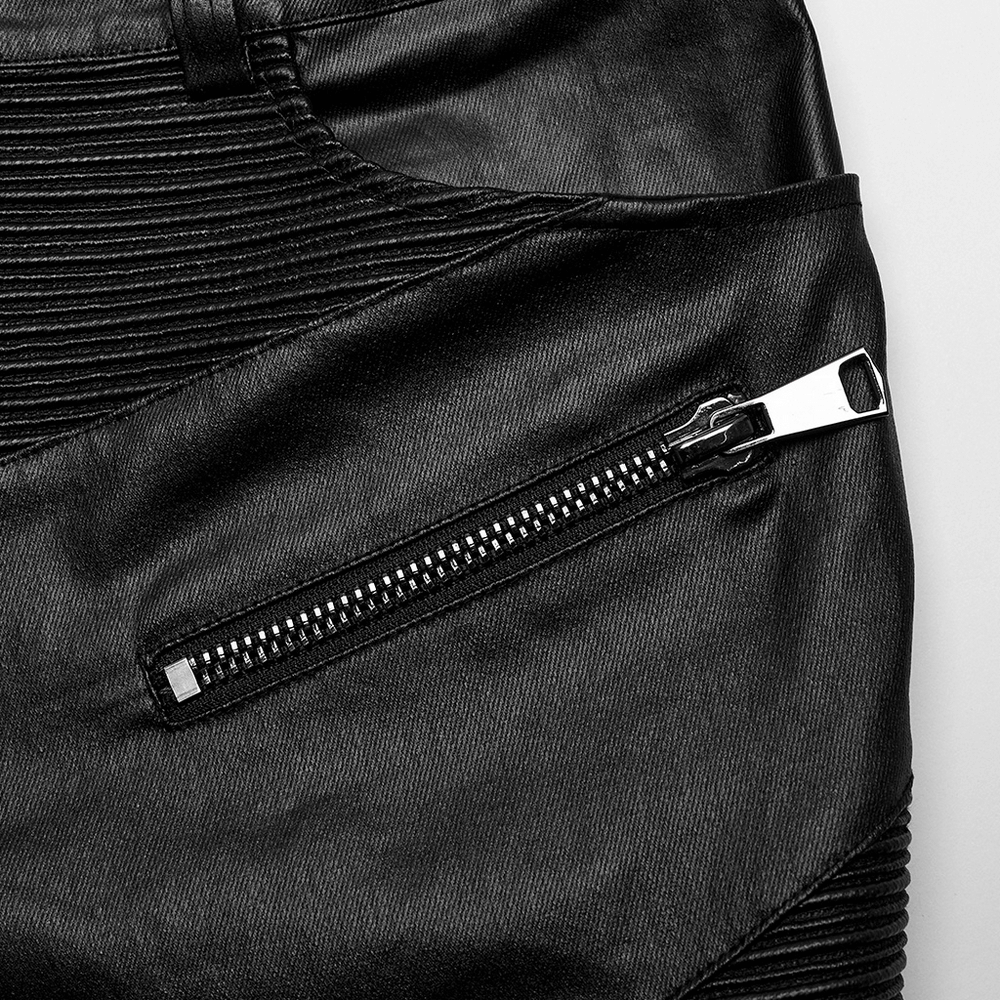 Close-up of elastic punk style leather pants showcasing zipper detail and textured panels for edgy fashion.