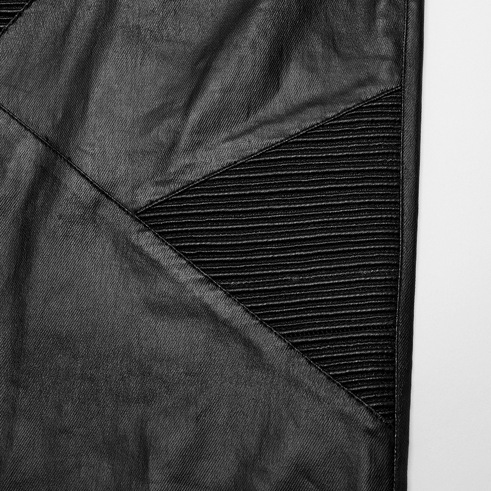Detail view of black elastic punk leather fabric showcasing unique panel design and textured elements.