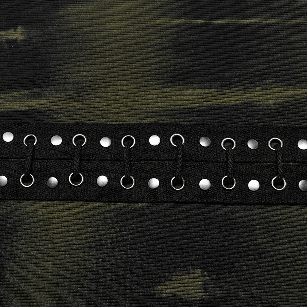 Close-up of elastic rib fabric with tie-dye print and silver eyelet drawstring detail, showcasing stylish texture.