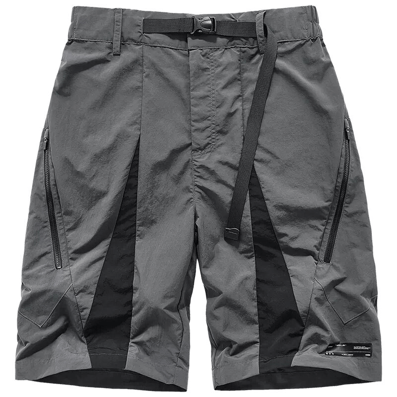Men's grey elastic waist tactical shorts with zippered pockets for style and functionality.