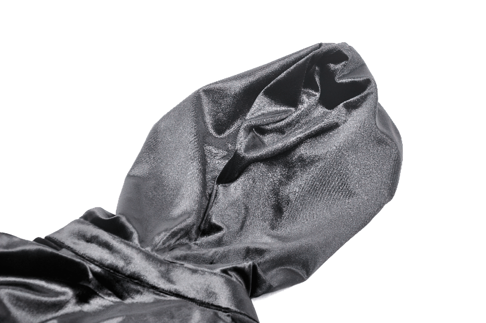Close-up of the hood of a black velvet cape, showcasing its soft texture and dramatic design details.