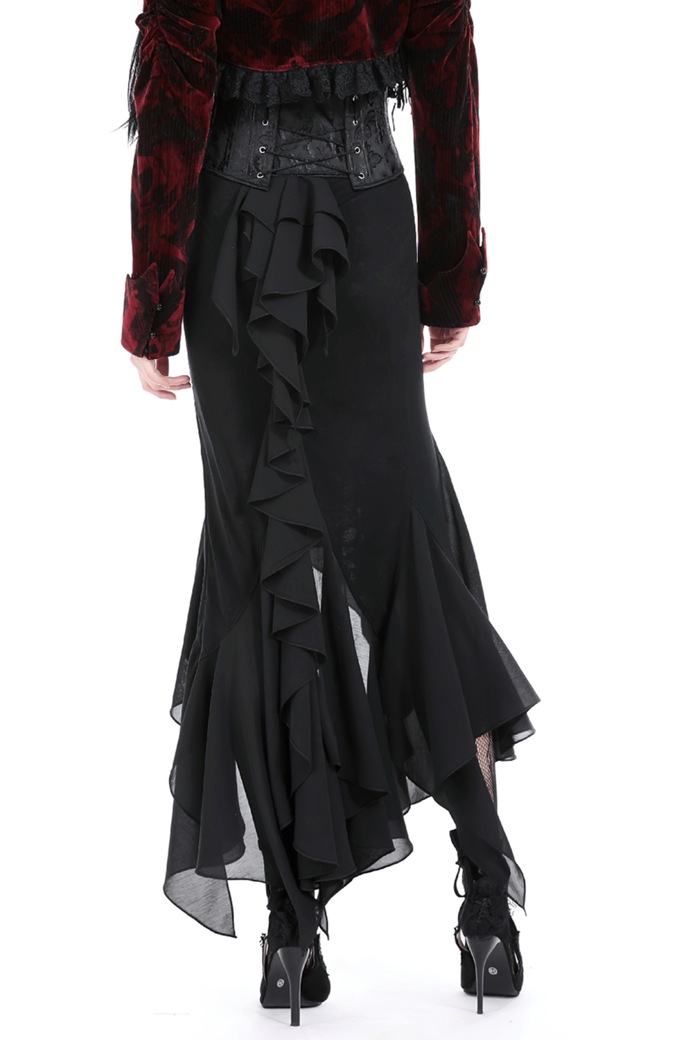 Back view of an elegant black asymmetrical skirt with dramatic ruffles and a flowy silhouette.